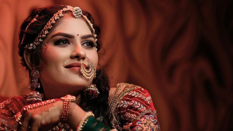 A pakistani bridal carrying a specific asian dress code for her wedding