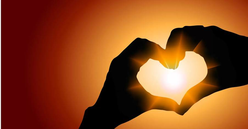 Ahandmakingaheartshapewiththesun  ai generatedcontentmaybeincorrect.