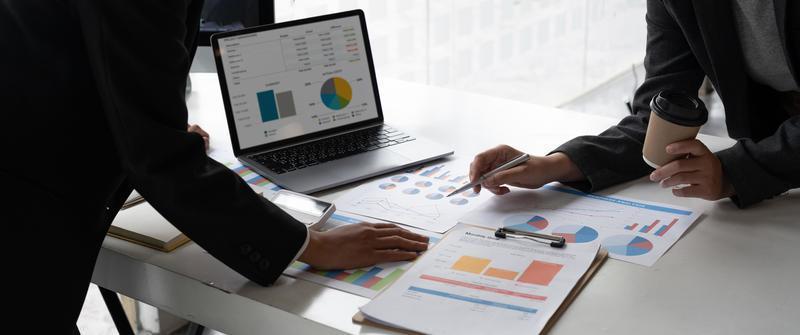 Business consultants is checking and analysis sales figures to plan business strategies photo